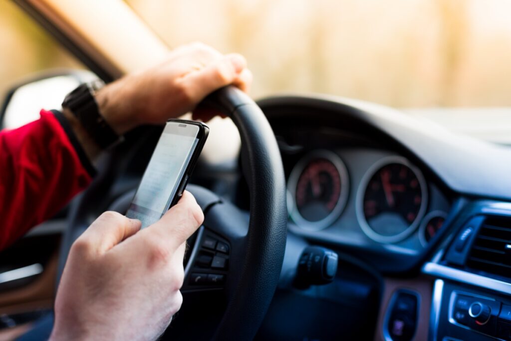 Can cell phone bans prevent distracted driving accidents